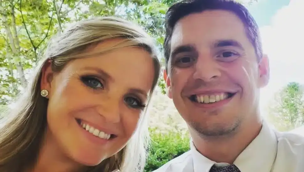 Tim Chiarolanza and his wife Sarah smiling together outdoors